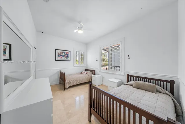 a bedroom with furniture and a couch