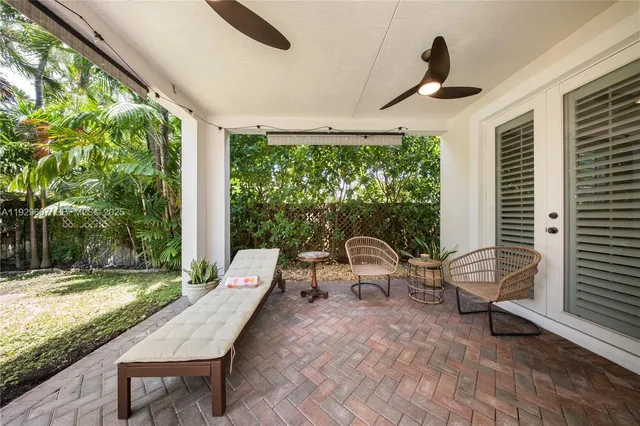 a view of swimming pool with a patio