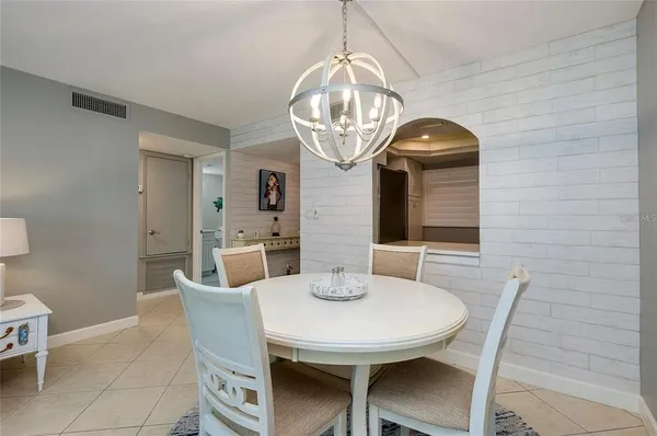 a view of a dining room with furniture