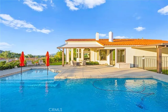 a view of a city with mountains in the background