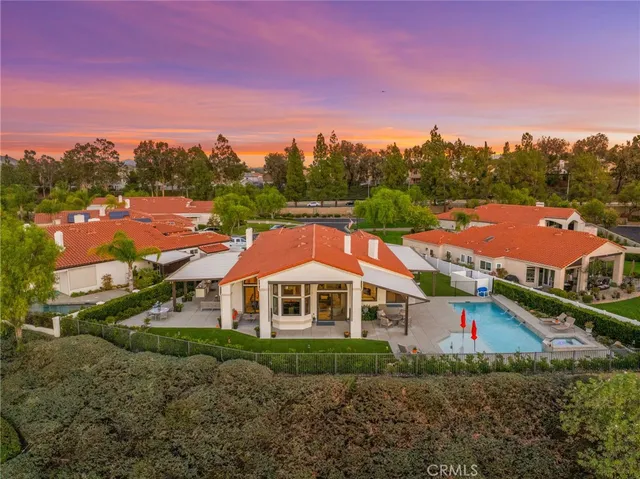 a view of a big room with swimming pool and a yard