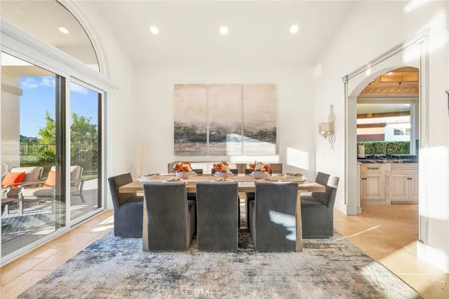 a view of a living room and a balcony
