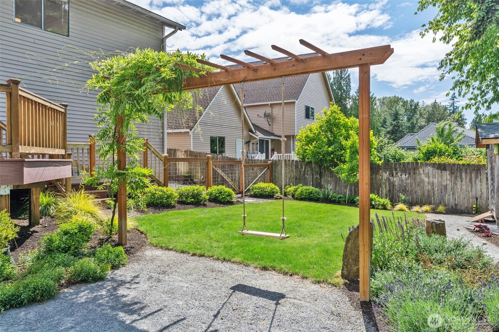 2101 233rd Street Southeast Bothell, WA 98021 - Photo 29 of 40 a front view of a house with garden