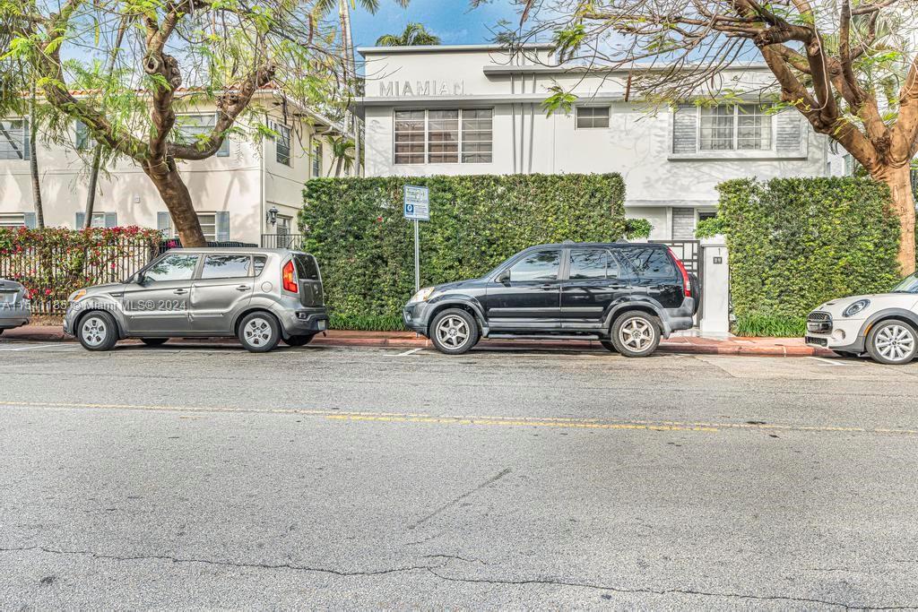 a car parked in front of a house