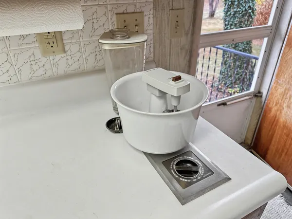 a white bath tub sitting in a bathroom
