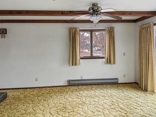 a view of a livingroom with an entryway