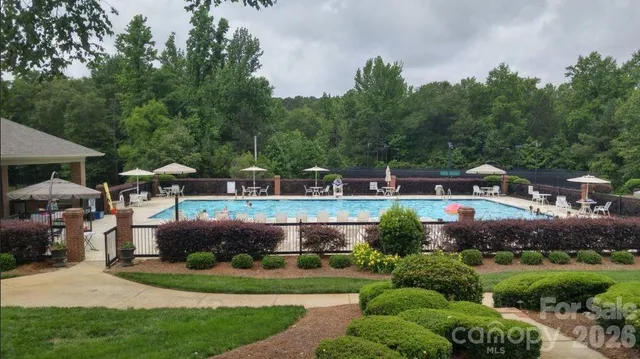 an aerial view of a house with a garden