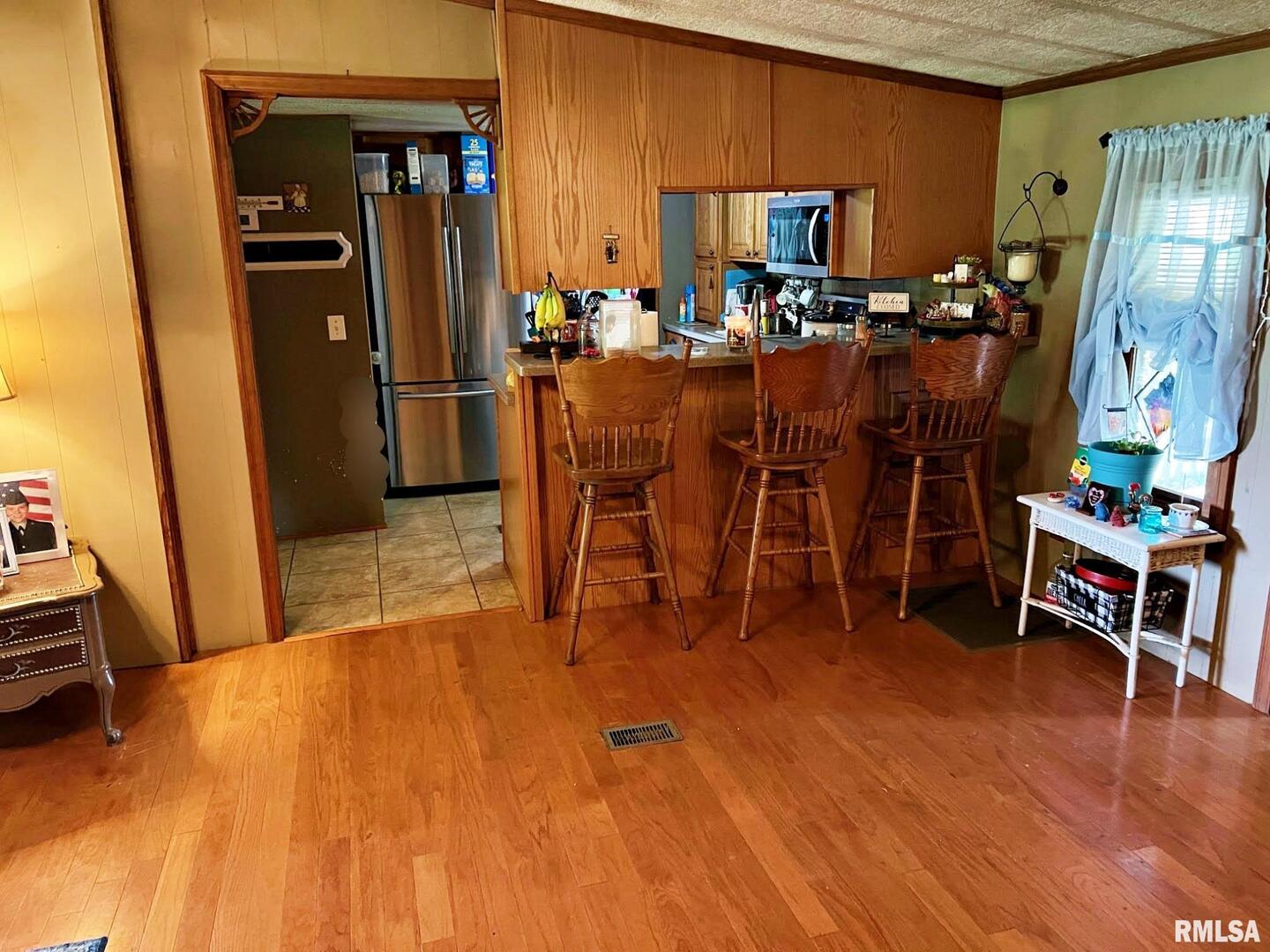 2516 Strawberry Road Metropolis, IL 62960 - Photo 11 of 25 a view of a dining room with furniture and chandelier