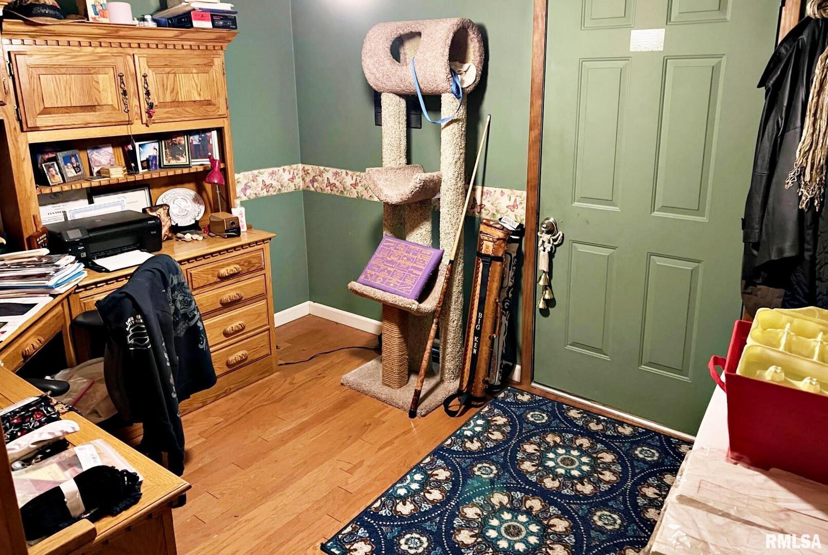 2516 Strawberry Road Metropolis, IL 62960 - Photo 15 of 25 a bed room with a bed and a book shelf