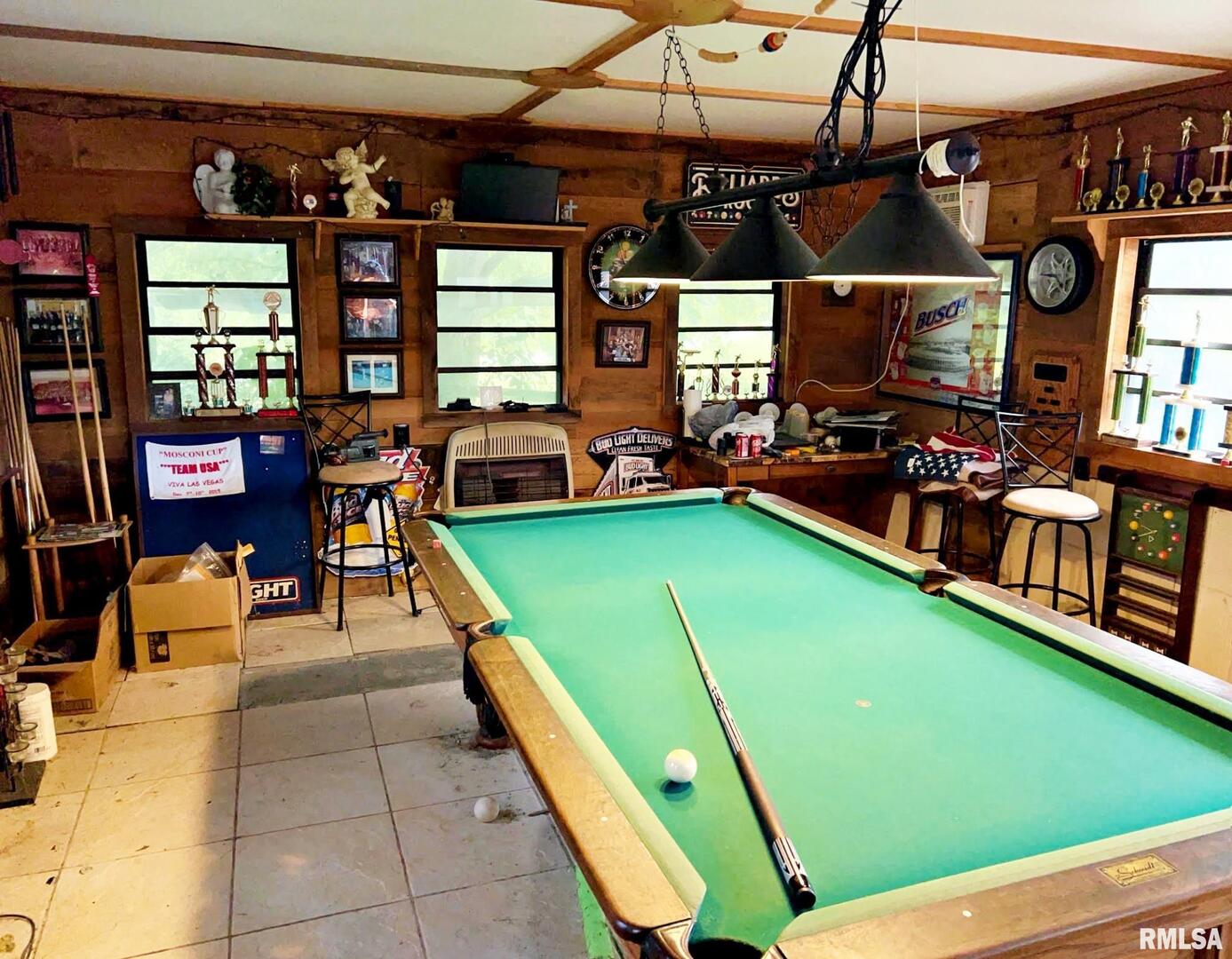 2516 Strawberry Road Metropolis, IL 62960 - Photo 17 of 25 a room with lots of tables and chairs