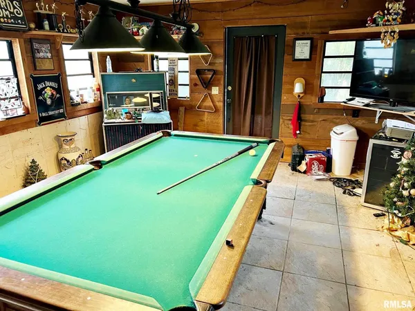 a view of a swimming pool with a big yard