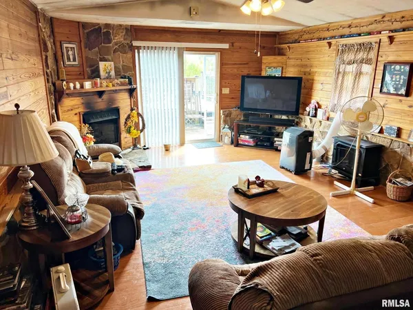 a living room with furniture and a table