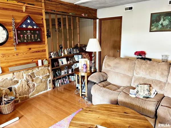 a kitchen with stainless steel appliances a stove and a microwave
