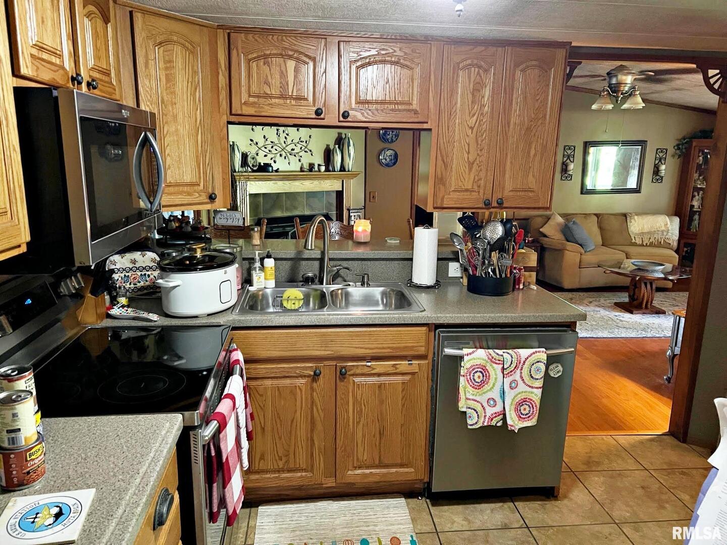 2516 Strawberry Road Metropolis, IL 62960 - Photo 8 of 25 a kitchen with a stove and cabinets