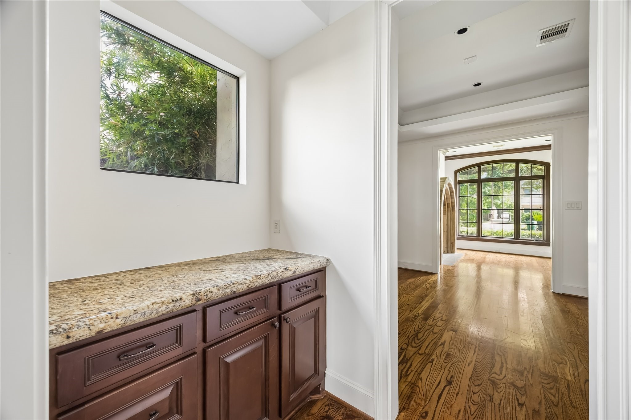 2246 Branard Street Houston, TX 77098 - Photo 9 of 40 Convenient built-in workspace and storage area tucked discreetly between the kitchen and front living spaces.