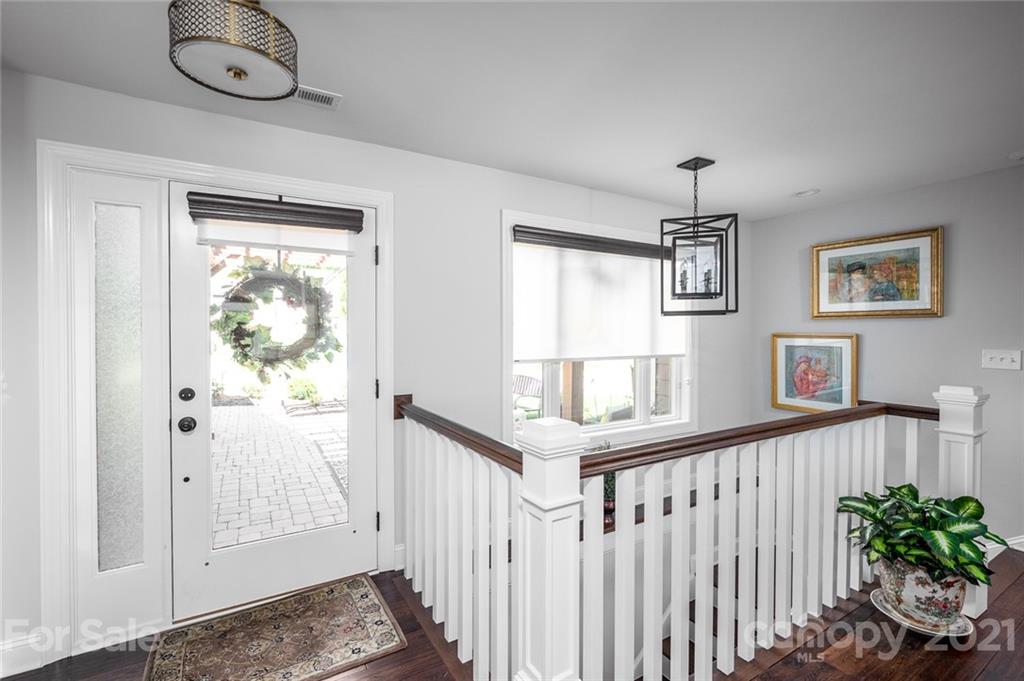 19007 Kailua Circle Tega Cay, SC 29708 - Photo 3 of 45 a view of a livingroom with wooden floor and a window