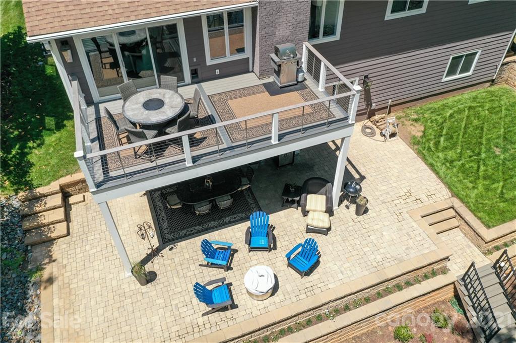 19007 Kailua Circle Tega Cay, SC 29708 - Photo 27 of 45 a view of a table and chairs in the patio