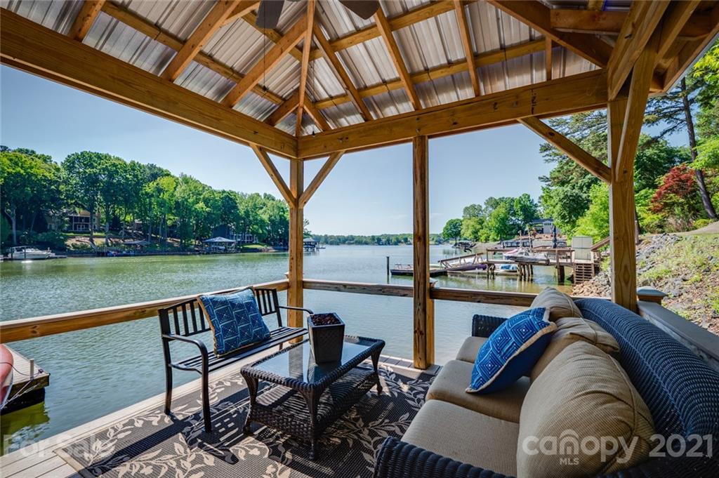 19007 Kailua Circle Tega Cay, SC 29708 - Photo 34 of 45 a view of balcony with outdoor seating and lake view