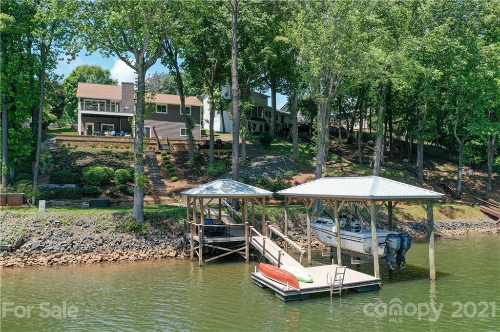 19007 Kailua Circle Tega Cay, SC 29708 - Photo 37 of 45 a backyard of a house with yard table and chairs