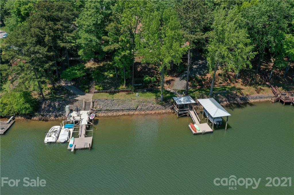 19007 Kailua Circle Tega Cay, SC 29708 - Photo 42 of 45 a view of a lake with lawn chairs