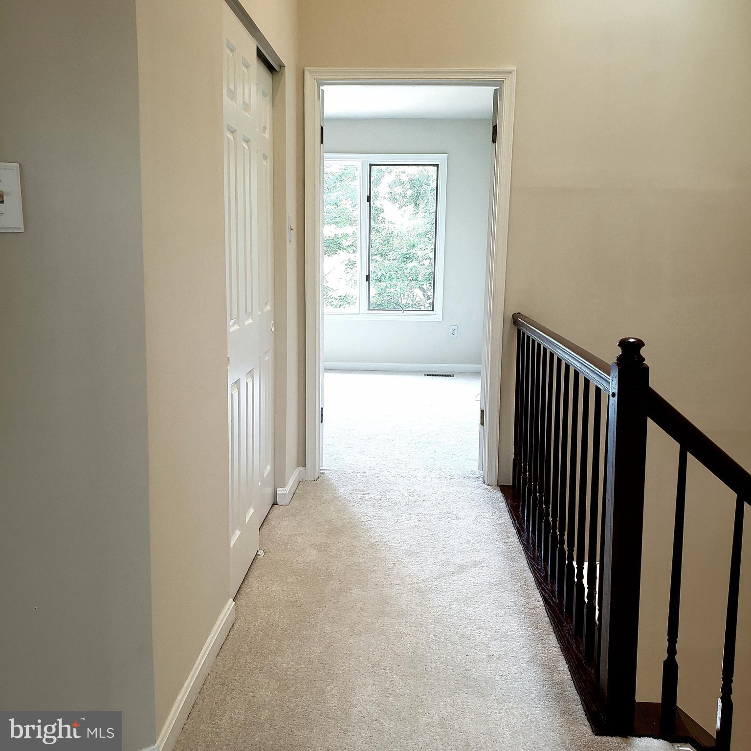 5263 Columbia Road, Unit 492 Columbia, MD 21044 - Photo 33 of 47 Walkway from bedroom 1/2 to master