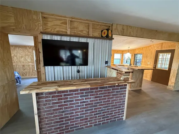 a bathroom with a sink and mirror