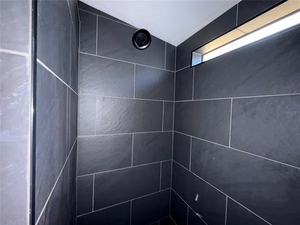 a view of staircase with wooden floor