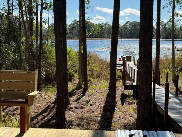 a vase of flowers sitting on a table