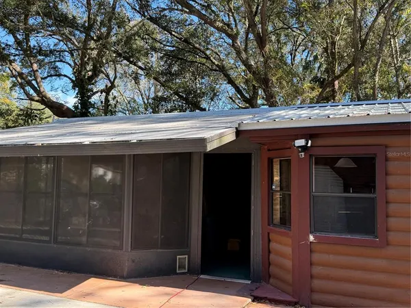 a view of a fireplace in kitchen and furniture