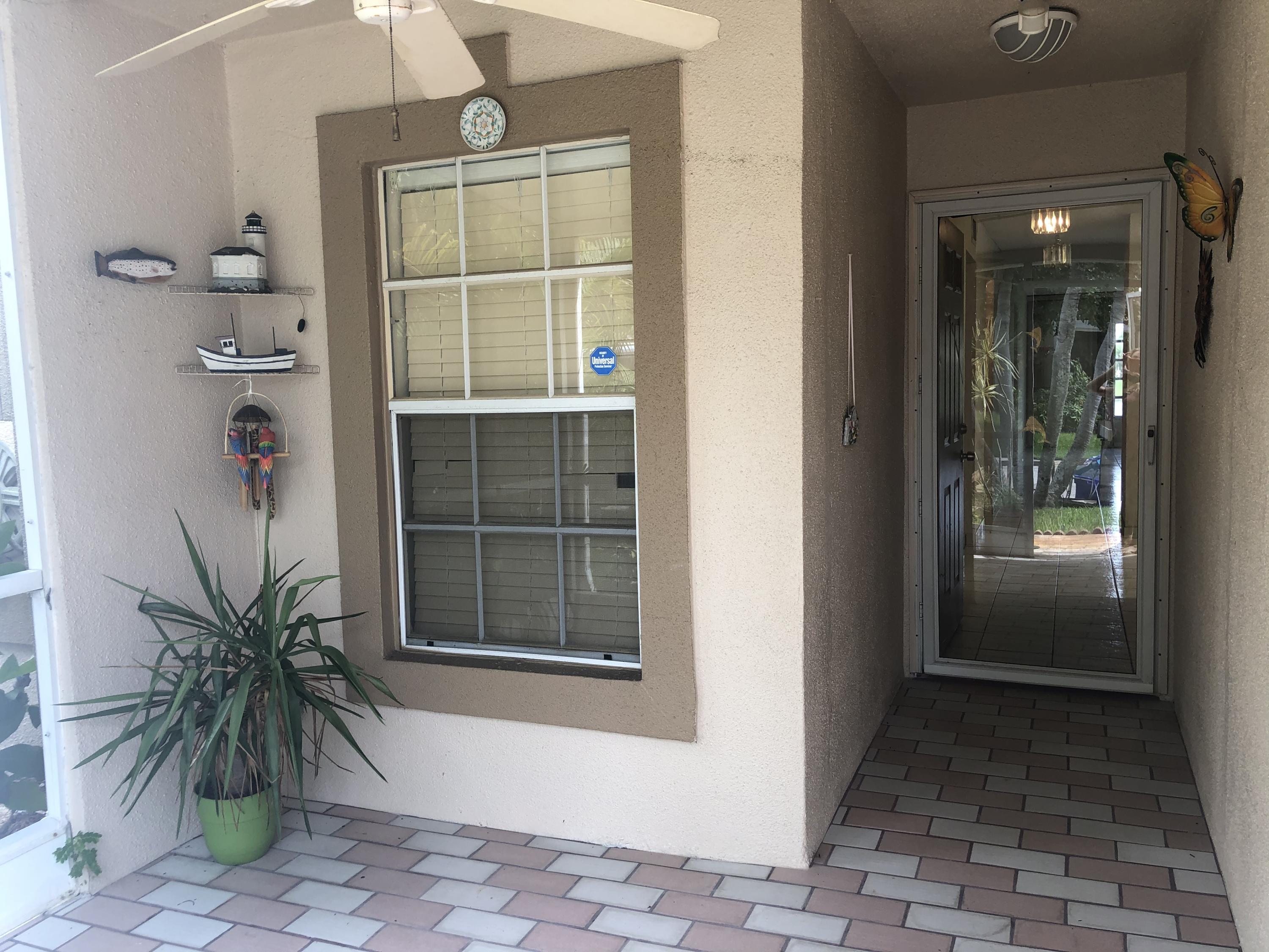 9071 Fairbanks Lane, Unit 8 Boca Raton, FL 33496 - Photo 3 of 16 Front Patio