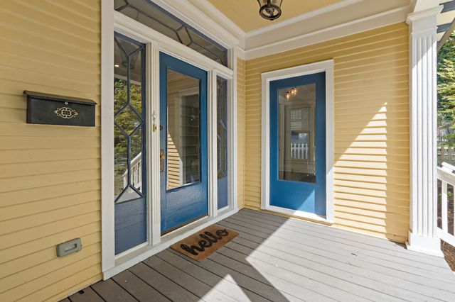 a view of a livingroom with wooden floor