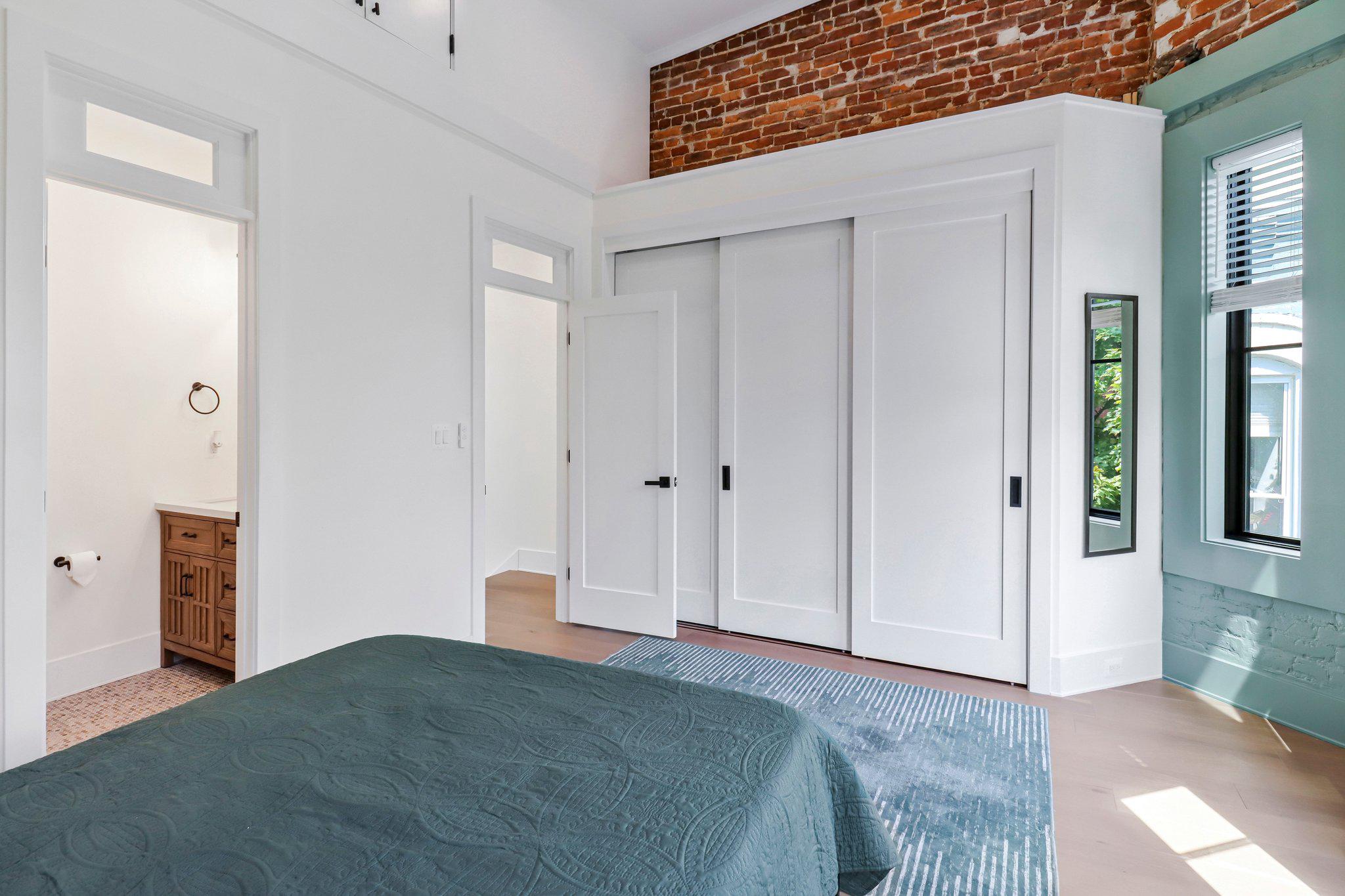 29 N Street Northwest, Unit 2 Washington, DC 20001 - Photo 14 of 34 Charming bedroom with exposed brick.