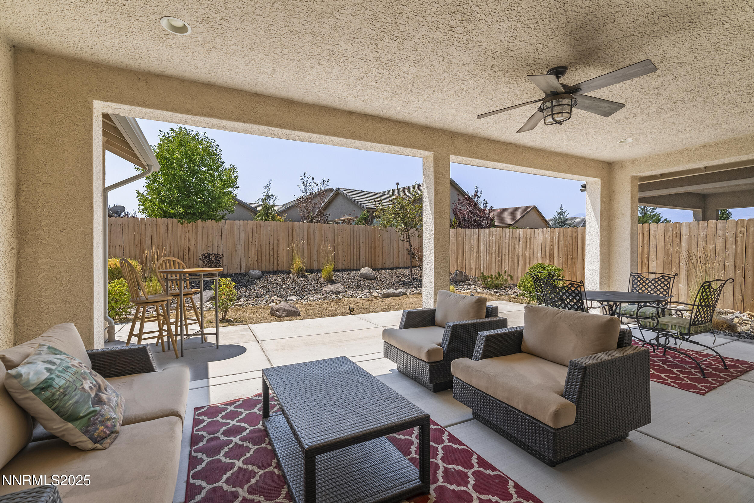 2280 Hyperion Lane Reno, NV 89521 - Photo 4 of 48 a living room with furniture and a large window