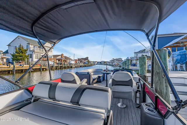 a bathroom with a shower and a window
