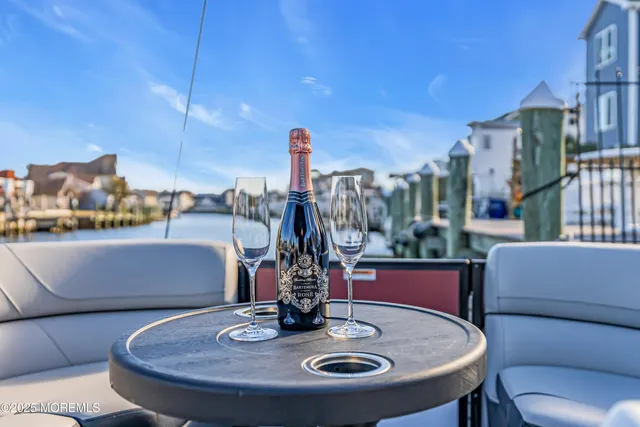 a view of a balcony with furniture