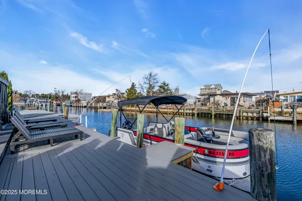 a view of a balcony with furniture