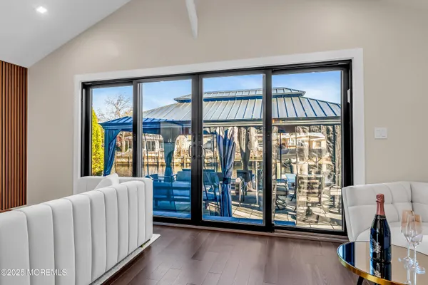 a view of a balcony with furniture