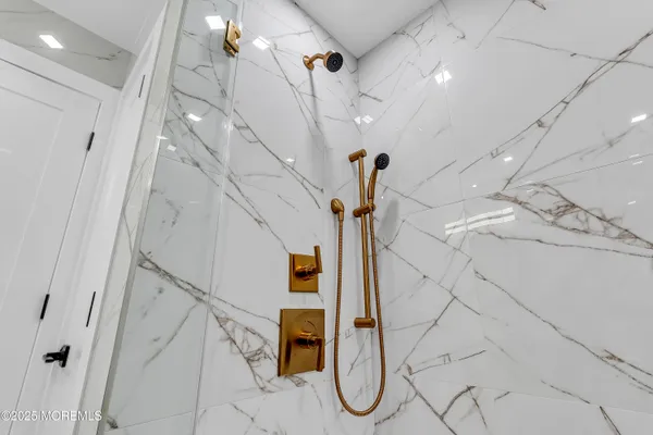 a bedroom with a bed and a walk in closet