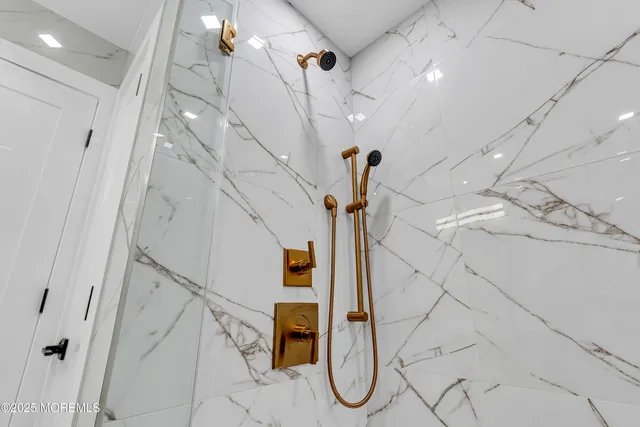 a bedroom with a bed and a walk in closet