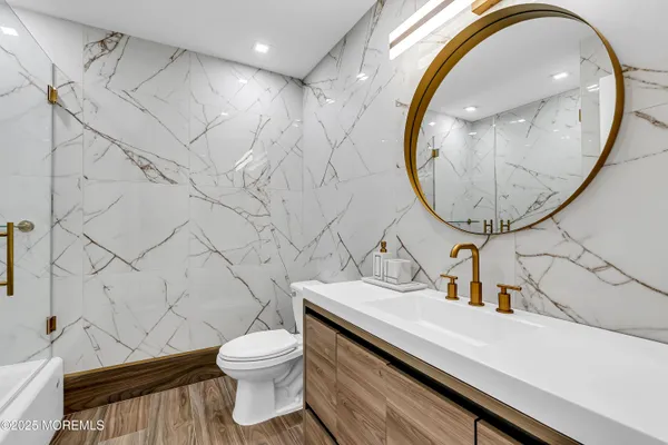 a work room with furniture and a large window