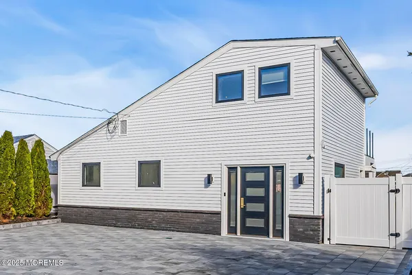 a view of a lake with sitting area