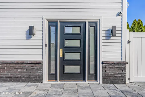 a view of a pathway with a backyard