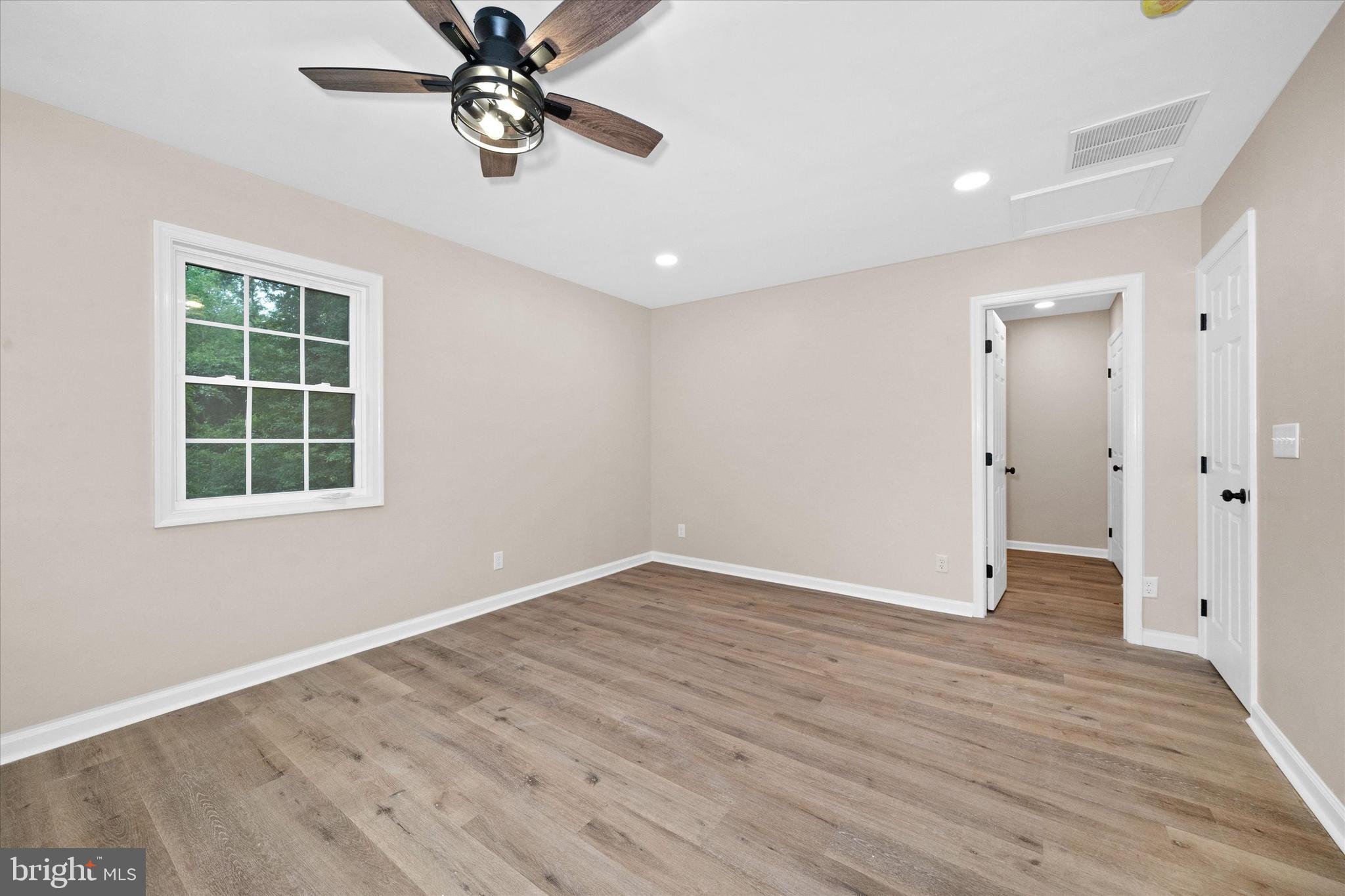 834 Willow Grove Road Felton, DE 19943 - Photo 19 of 48 wooden floor in an empty room with a window