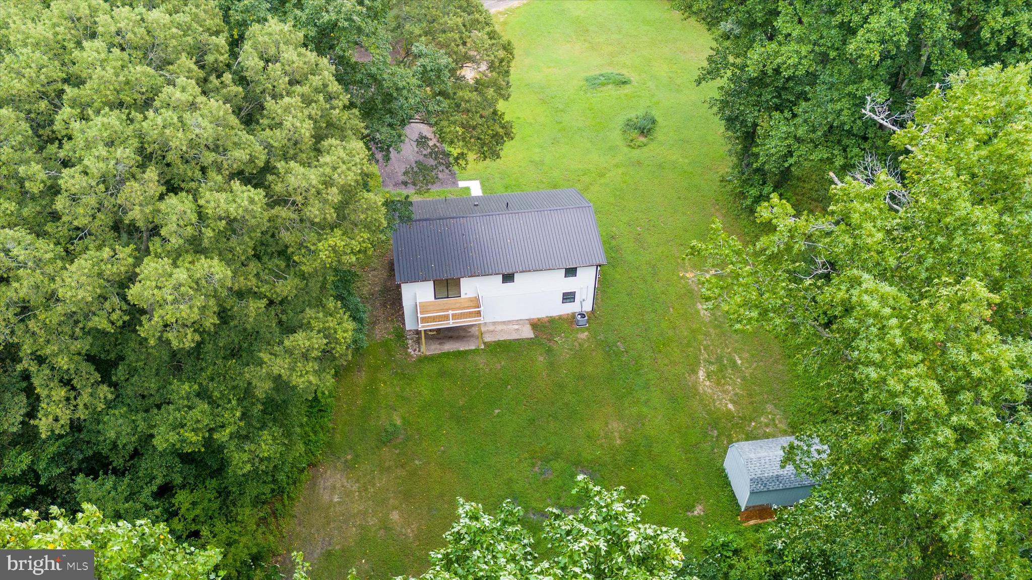 834 Willow Grove Road Felton, DE 19943 - Photo 37 of 48 an aerial view of a house with a yard