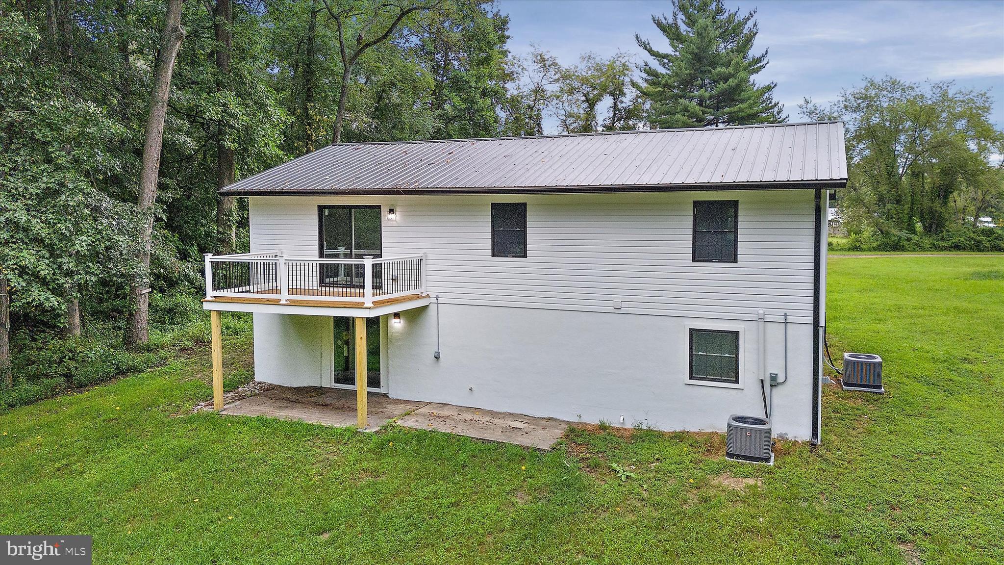 834 Willow Grove Road Felton, DE 19943 - Photo 38 of 48 a view of a house with a yard