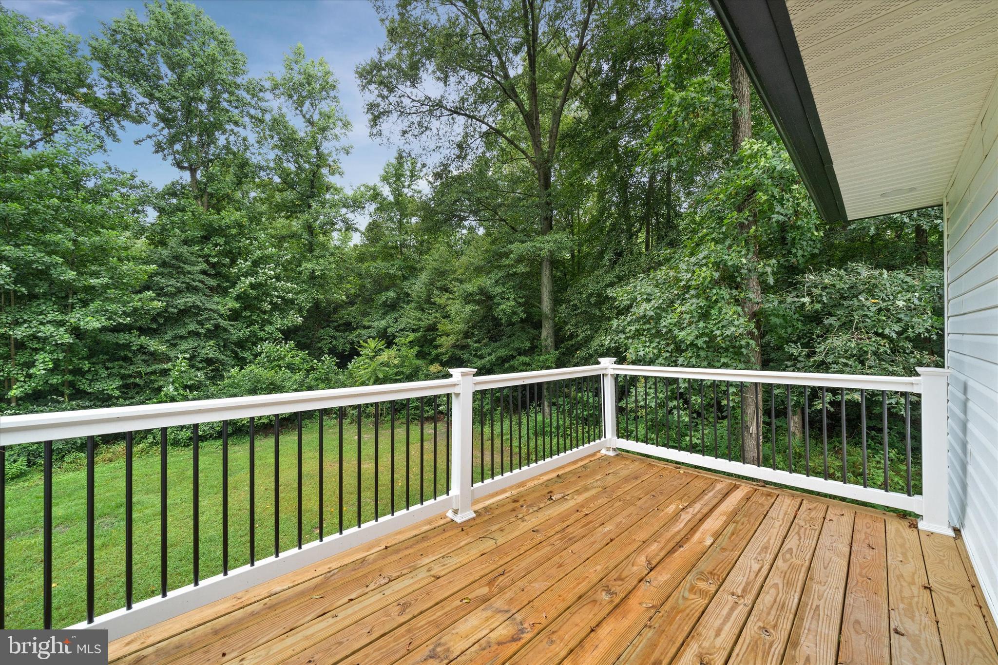 834 Willow Grove Road Felton, DE 19943 - Photo 45 of 48 a view of balcony with wooden floor and fence