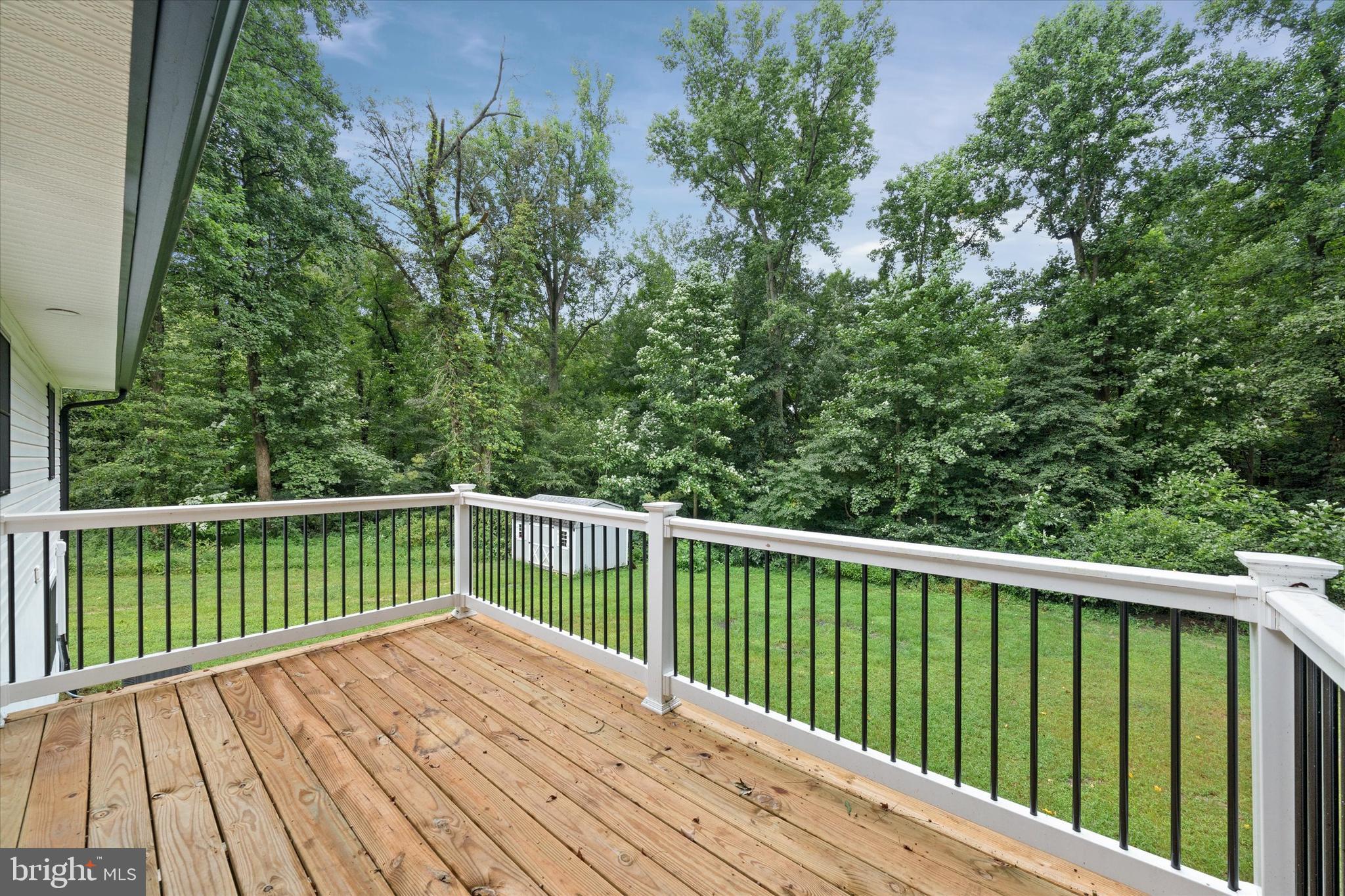 834 Willow Grove Road Felton, DE 19943 - Photo 46 of 48 a view of balcony with wooden floor and fence