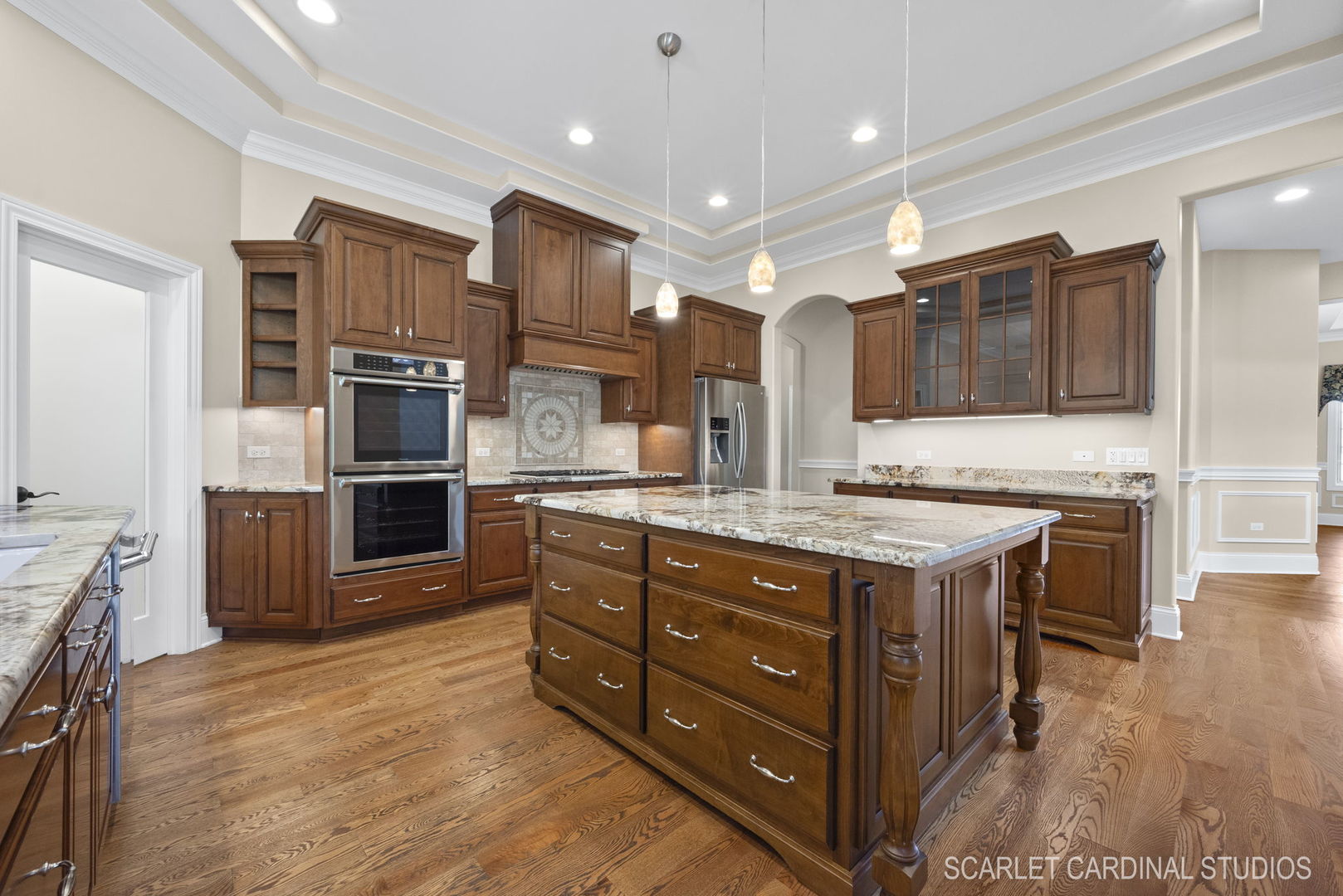13334 Kerr Street Plainfield, IL 60585 - Photo 13 of 53 a kitchen with stainless steel appliances granite countertop a stove and a refrigerator