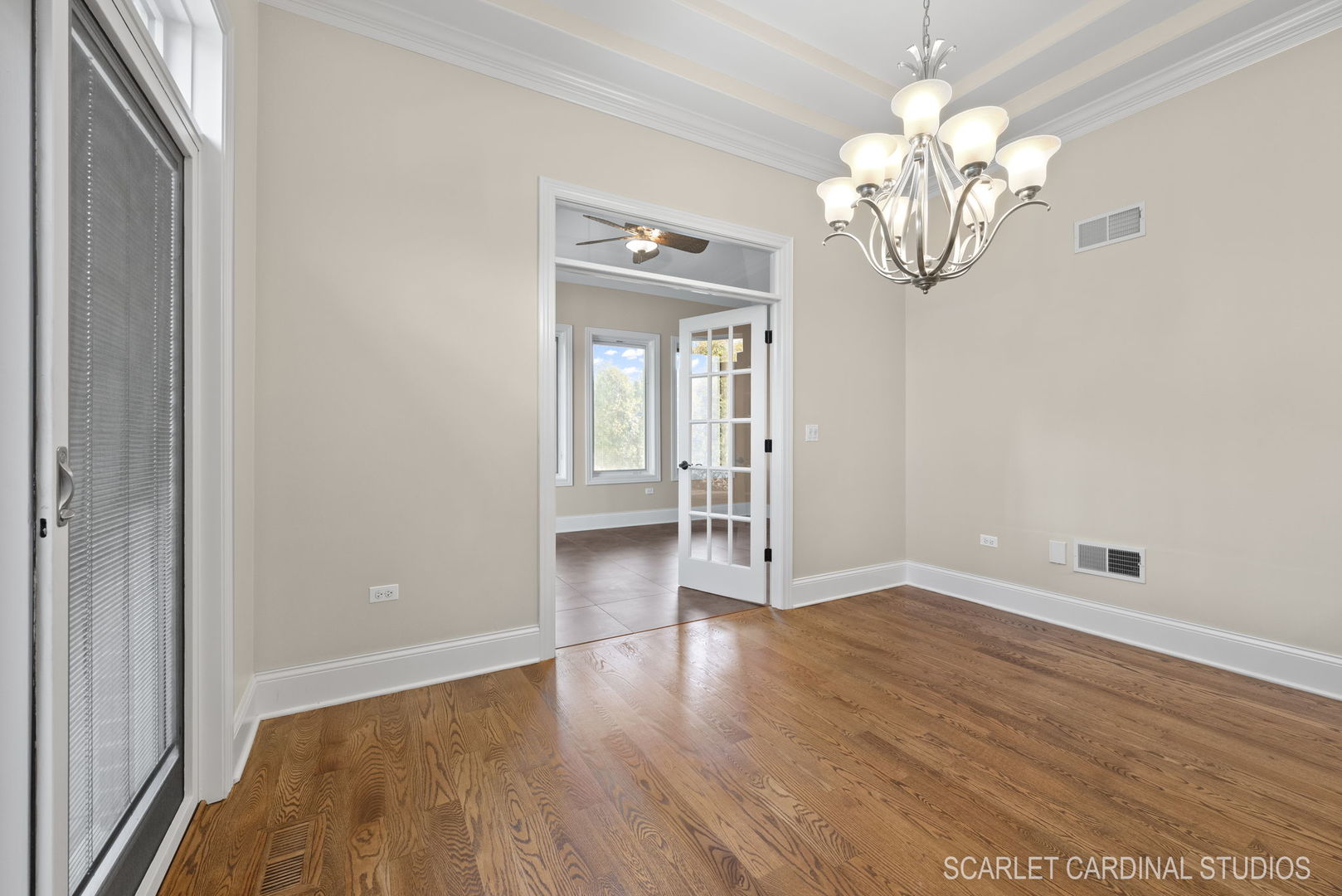 13334 Kerr Street Plainfield, IL 60585 - Photo 15 of 53 wooden floor in an empty room with a window