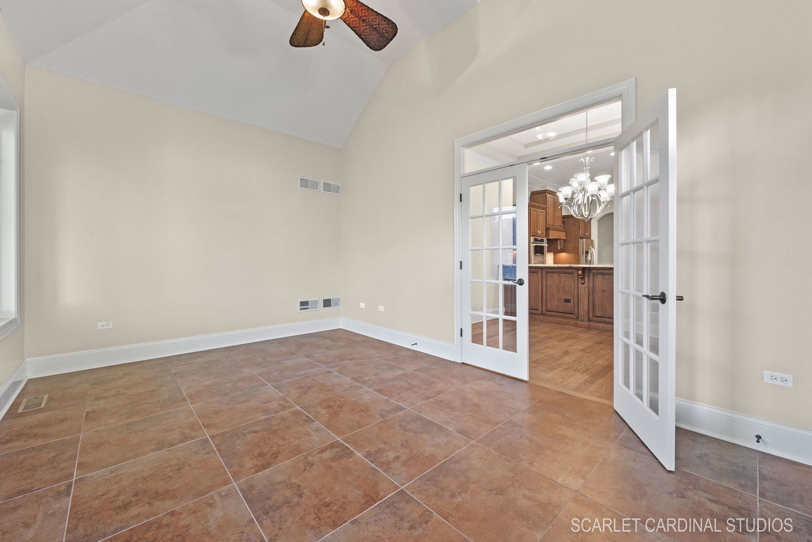 13334 Kerr Street Plainfield, IL 60585 - Photo 18 of 53 an empty room with chandelier fan and windows